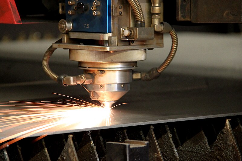 A Laser Cutter being used to cut through metal.