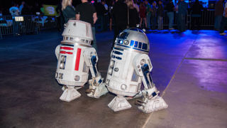 R5-D4 rolling around with R2-D2