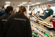 Housekeeping team looking at LEGO Silverstone display