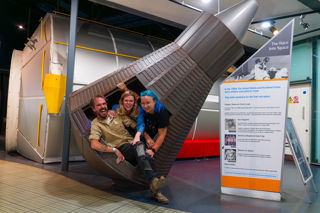Space Lates group in the Mercury Capsule in the Into Space Gallery