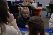 Young girl discovers a new game at To Boldly Game