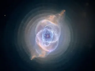 The full beauty of the Cat's Eye Nebula (NGC 6543) is revealed in this new, detailed view from NASA's Hubble Space Telescope. The image from Hubble's Advanced Camera for Surveys (ACS) shows a bull's eye pattern of eleven or even more concentric rings, or shells, around the Cat's Eye.