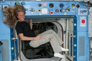 Karen Nyberg With Sticker Patches on ISS