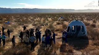Blue Origin completing a crewed mission to space.