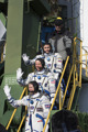 Soyuz TMA 19M Crew Members Greeting Audience At The Launch Pad