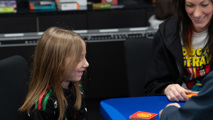 Mother and daughter enjoying a game at To Boldly Game
