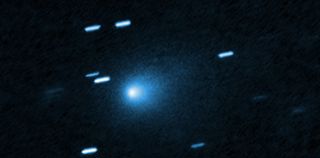 An image of Comet 3I/ATLAS captured by the Hubble Space Telescope, with stars appearing as streaks in the background