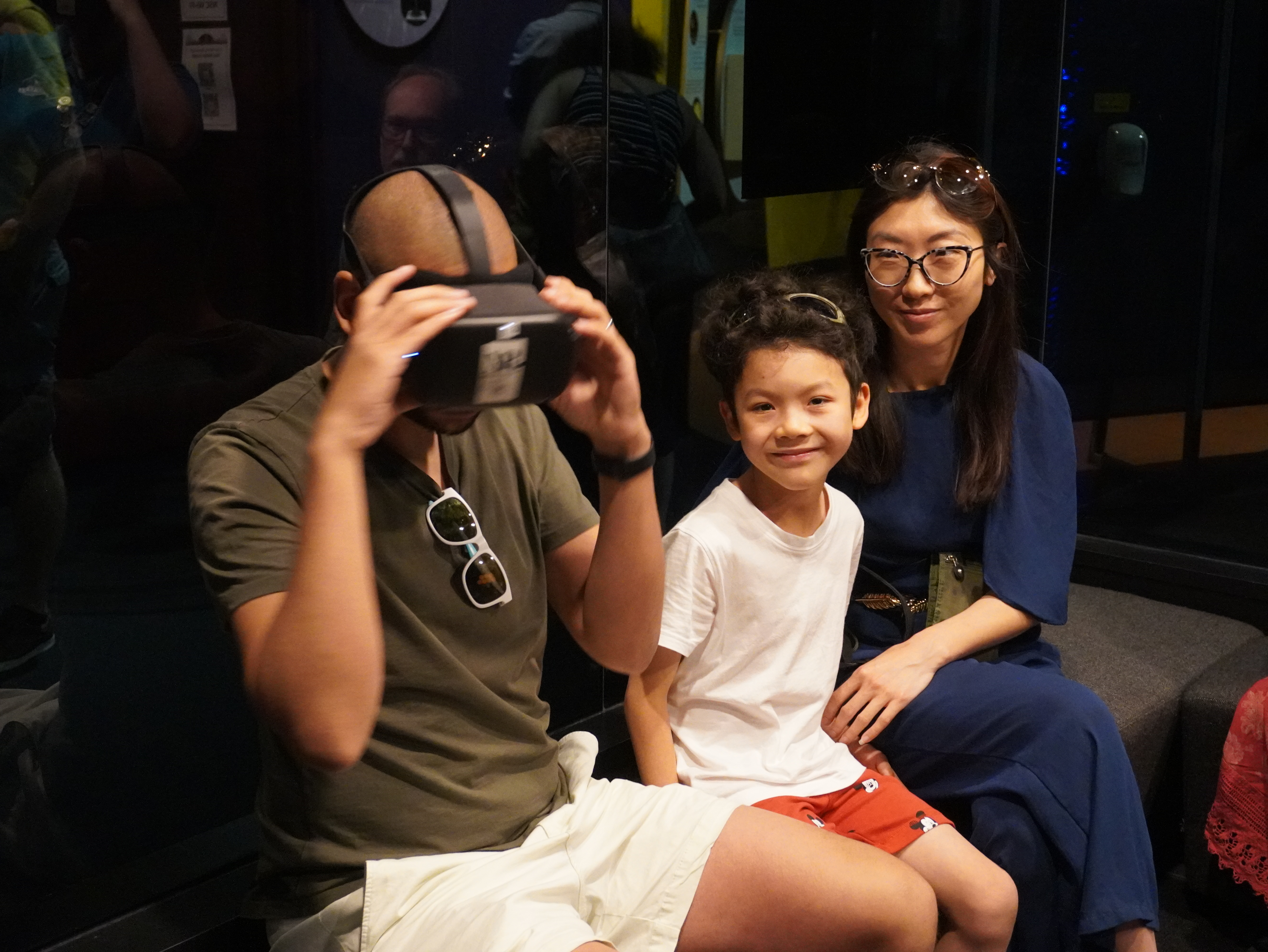 Family using a VR headset at the UK in Space festival