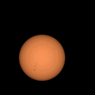 Mars' moon Phobos crosses the face of the sun, captured by NASA’s Perseverance rover on Mars.