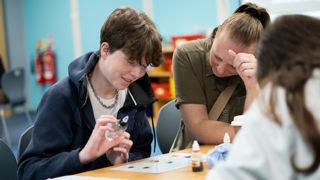 Teenager and Mother at Home Education Day