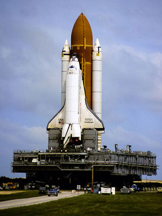 Space shuttle Challenger being moved to the launch pad, 1985.