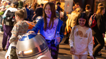 Two girls meet R2D2 at Galactic Gathering