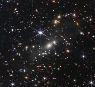 The Webb Telescope's first deep field showcasing many distant galaxies.