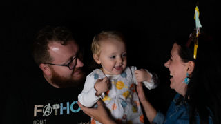 Family and toddler in the Tinytarium