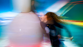 Children enjoying the interactive floor in the Home Planet gallery